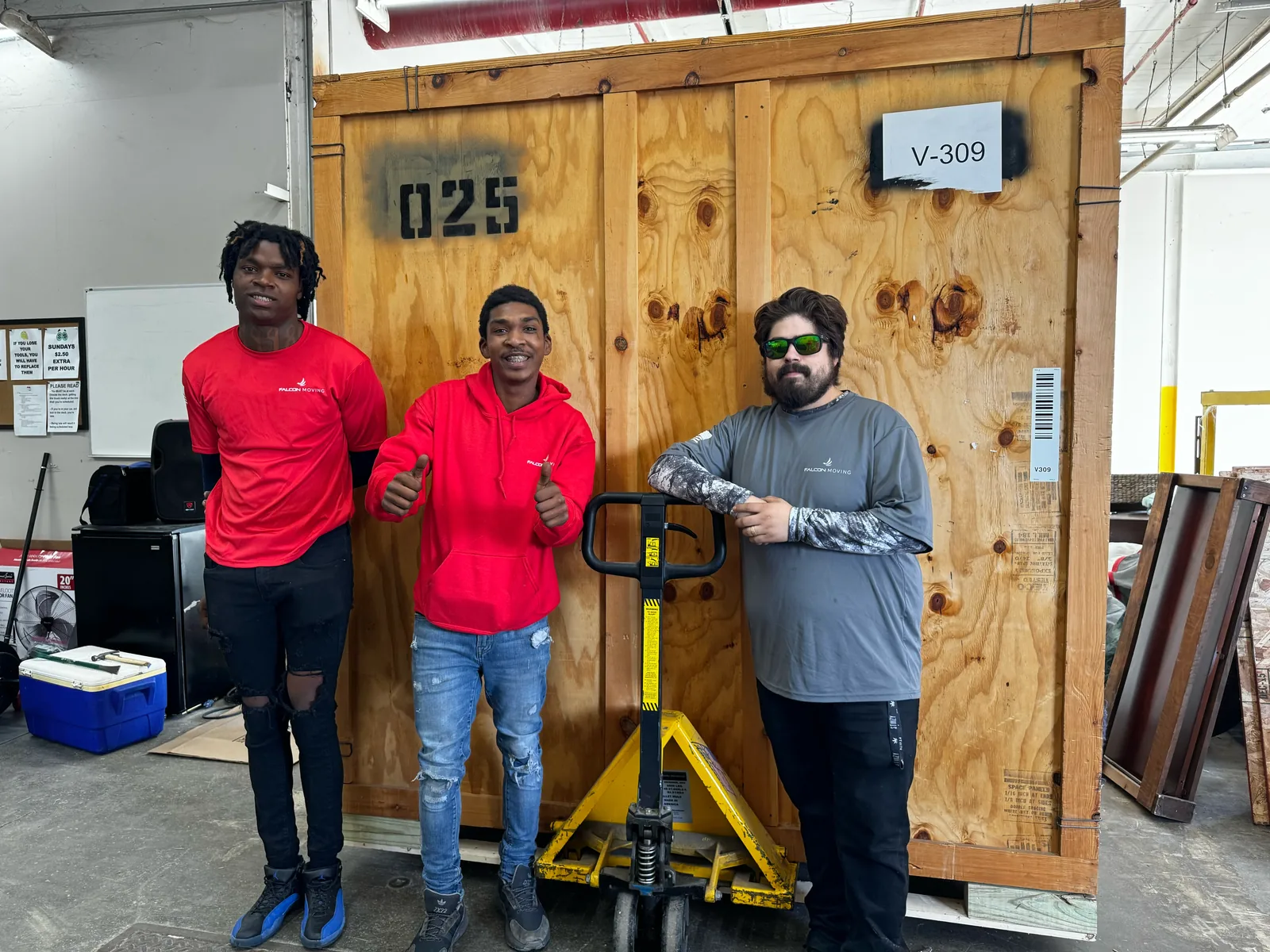 Falcon crew handling storage items for a South Elgin client