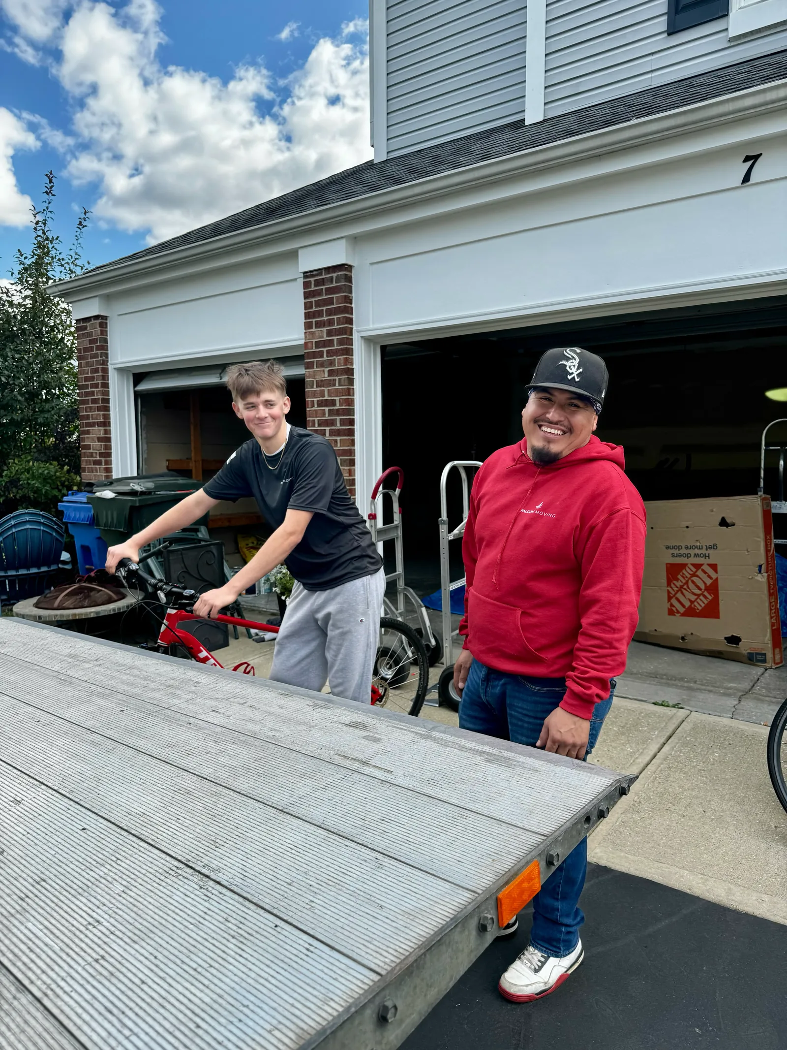 Falcon Moving team smiling on a sunny Illinois move day